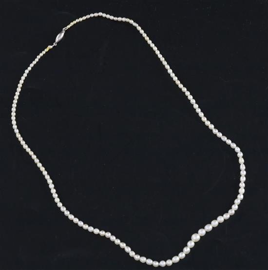 A single strand graduated natural saltwater pearl necklace, with Gem & Pearl Laboratory report dated 9/10/2015, approx 41cm.